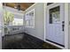 Inviting front porch featuring a swing, perfect for relaxing and enjoying the outdoors at 1704 Tolbert Way, Mount Pleasant, SC 29466