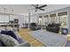 Open-concept layout with a living room that flows into kitchen and dining area at 1704 Tolbert Way, Mount Pleasant, SC 29466