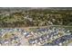 Gorgeous aerial view of the neighborhood showcasing the community, the pond, and the lush green space at 1772 Agate Bay Dr, Mount Pleasant, SC 29466