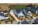 Stunning aerial view of the homes and community showcasing the lush landscaping, pond and proximity to local amenities at 1772 Agate Bay Dr, Mount Pleasant, SC 29466