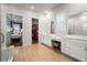 Bright primary bathroom with double vanity, shower, and walk-in closet at 1772 Agate Bay Dr, Mount Pleasant, SC 29466