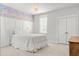 Cozy bedroom with accent wall, decorative lighting, and ample closet space at 1772 Agate Bay Dr, Mount Pleasant, SC 29466