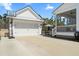 Garage and driveway featuring a basketball hoop for recreation and additional outdoor activities at 1772 Agate Bay Dr, Mount Pleasant, SC 29466