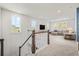 Bright and spacious room with staircase, plush carpet and large windows at 1772 Agate Bay Dr, Mount Pleasant, SC 29466