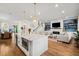 A spacious and stylish open concept kitchen, living and dining area provides ample room for relaxation and entertainment at 1772 Agate Bay Dr, Mount Pleasant, SC 29466