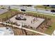 Overhead view of a ship-themed playground with swings and benches in a fenced-in area at 1772 Agate Bay Dr, Mount Pleasant, SC 29466