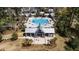 Aerial view of the community pool area with a large pool, seating areas, and playground at 1772 Agate Bay Dr, Mount Pleasant, SC 29466