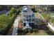 Aerial view of the home with long driveway, landscaped yard and a glimpse of the back porch at 185 5Th Ave, Mount Pleasant, SC 29464