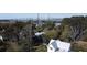 Another aerial view of the house, nearby homes and the Ravenel Bridge in the background at 185 5Th Ave, Mount Pleasant, SC 29464