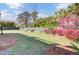Spacious backyard with a well-maintained lawn and a wooden fence for privacy at 185 5Th Ave, Mount Pleasant, SC 29464