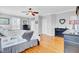 Spacious bedroom features natural light, hardwood floors, and stylish decor at 185 5Th Ave, Mount Pleasant, SC 29464