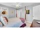 A bright bedroom featuring a four-poster bed, neutral walls and decorative accents at 185 5Th Ave, Mount Pleasant, SC 29464