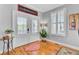 Bright foyer with hardwood floors, natural light, and stylish decor, providing a warm welcome at 185 5Th Ave, Mount Pleasant, SC 29464