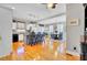Modern kitchen with island, barstool seating, stainless appliances, and connected dining area at 185 5Th Ave, Mount Pleasant, SC 29464