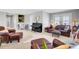 Open floorplan features an entertaining space with an upright piano and living area at 185 5Th Ave, Mount Pleasant, SC 29464