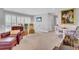 Large living room with piano, sitting area, and plenty of natural light at 185 5Th Ave, Mount Pleasant, SC 29464
