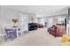 Spacious living room with neutral colors and dual seating areas at 185 5Th Ave, Mount Pleasant, SC 29464