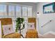 Cozy sitting area with patterned chairs and ample natural light from window at 185 5Th Ave, Mount Pleasant, SC 29464