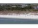 Expansive aerial view showcases the beach, shoreline, and surrounding residential neighborhood at 2014 Ion Ave, Sullivans Island, SC 29482
