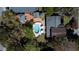 Bird's-eye view of the property featuring a pool, outdoor living spaces, and lush landscaping at 2014 Ion Ave, Sullivans Island, SC 29482