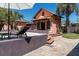 Private backyard oasis featuring a sparkling pool, lounge chairs, and a guest house. Perfect for relaxation and outdoor entertainment at 2014 Ion Ave, Sullivans Island, SC 29482