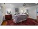 Cozy bedroom featuring a ceiling fan, with elegant furnishings and bright natural light at 2014 Ion Ave, Sullivans Island, SC 29482