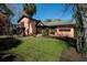 Charming home featuring a well-manicured lawn, inviting entrance, and appealing curb appeal with mature landscaping at 2014 Ion Ave, Sullivans Island, SC 29482