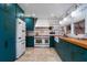 Updated kitchen with custom cabinetry, farmhouse sink, and a chef's range and refrigerator at 2014 Ion Ave, Sullivans Island, SC 29482