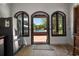 View from the interior to the pool, with elegant windows at 2014 Ion Ave, Sullivans Island, SC 29482