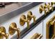 Close up of the commercial range knobs and burners at 2014 Ion Ave, Sullivans Island, SC 29482
