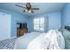 Comfortable bedroom with a view from a bed showcasing a window and a wooden TV cabinet at 204 Torslanda Ln, Summerville, SC 29486