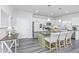 Modern kitchen with white cabinetry, granite countertops, stainless steel appliances, and a kitchen island at 204 Torslanda Ln, Summerville, SC 29486