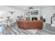 Cozy living room features a fireplace, gray flooring, and stylish decor at 204 Torslanda Ln, Summerville, SC 29486