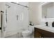 Modern bathroom featuring a sleek glass-enclosed shower with upscale fixtures at 208 James St, Summerville, SC 29483
