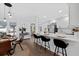 Elegant kitchen featuring a breakfast bar, modern appliances, and an open layout at 208 James St, Summerville, SC 29483