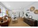 Inviting living room showcasing hardwood floors, modern furnishings, and a relaxed atmosphere at 208 James St, Summerville, SC 29483