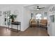 Bright sitting area features hardwood floors, comfortable seating, and plenty of natural light at 208 James St, Summerville, SC 29483