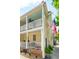 Charming home featuring double porches, an American flag, and beautiful curb appeal at 21 America St, Charleston, SC 29403