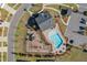 Aerial view of community pool, playground, and parking at 211 Saxony Loop, Summerville, SC 29486
