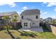 View of backyard featuring a concrete patio with fencing and palm trees at 211 Saxony Loop, Summerville, SC 29486