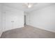 Bright bedroom with neutral carpet, closet and a view into an adjacent room at 211 Saxony Loop, Summerville, SC 29486