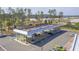 Aerial view of a modern gas station with a canopy and multiple pumps, located near a residential area at 211 Saxony Loop, Summerville, SC 29486
