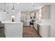 Bright kitchen featuring stainless steel appliances, a breakfast bar, and ample cabinet space at 211 Saxony Loop, Summerville, SC 29486