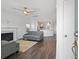 Bright and airy living room featuring a cozy fireplace and an open view to the modern kitchen at 211 Saxony Loop, Summerville, SC 29486