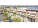 An aerial view of new street-level retail stores, with palm trees and modern design in a commercial area at 211 Saxony Loop, Summerville, SC 29486