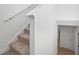 Carpeted stairway with white walls and banister leading to additional living space at 211 Saxony Loop, Summerville, SC 29486