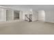 Spacious attic room with neutral carpet, storage shelves, and access to a stairwell at 2292 Beckenham Dr, Mount Pleasant, SC 29466