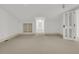 Minimalist attic featuring neutral carpet, and a decorative window letting in natural light at 2292 Beckenham Dr, Mount Pleasant, SC 29466