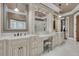 Beautiful bathroom boasting custom cabinetry, marble countertops, dual sinks, and a makeup vanity at 2292 Beckenham Dr, Mount Pleasant, SC 29466