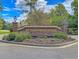 Beautiful community entrance to Masonborough featuring manicured landscaping and decorative brick signage at 2292 Beckenham Dr, Mount Pleasant, SC 29466